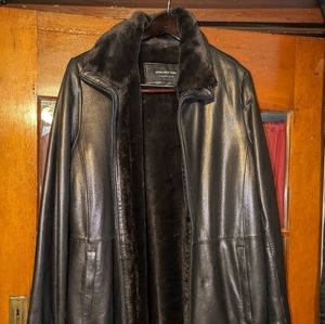 Worn once. Moving to a warmer climate where I won't need it.